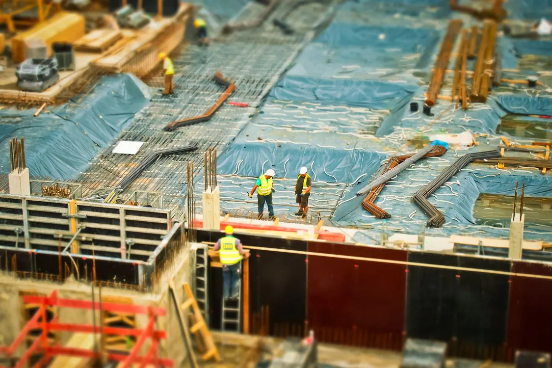 High-angle view of construction workers on a New York building site